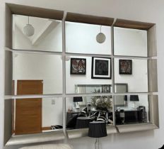 A large modern nine section wall mirror, each section measuring 90 x 65cm.