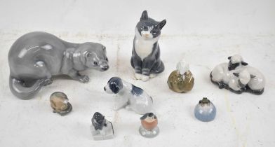 ROYAL COPENHAGEN; a collection of nine assorted animal figures comprising cat, mink, lambs, puppy,