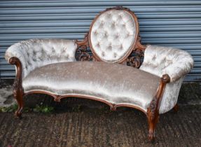 A 19th century rosewood carved settee, width 170cm.