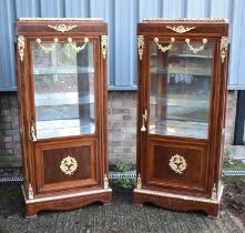 A pair of French style and gilt metal mounted vitrines with bevelled glass doors, width 76.5cm,