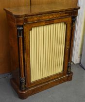 A Victorian inlaid walnut side cabinet with gilt metal mounts and single glazed door with interior