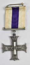 A WWII Military Cross, the reverse engraved 'Lieut Michael Shears Payne 8th King's Royal Irish