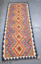 A handmade Chobi Kilim runner, 190 x 70cm.