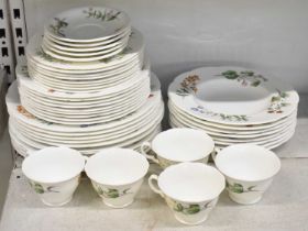 MINTON; a part tea and dinner service decorated in the 'Meadows' pattern, comprising eleven dinner