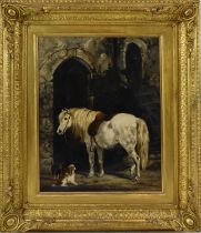 UNATTRIBUTED; a 19th century oil on canvas, stable scene depicting horse and two dogs, 39.5 x 29.