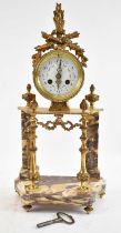 A late 19th century/early 20th century French marble and gilt metal eight day mantel clock with