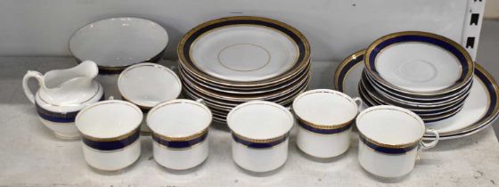 A Diamond China part tea service, comprising twelve side plates, two large plates, eight saucers,