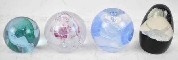 A group of four Caithness paperweights, to include 'Pastel' (4).