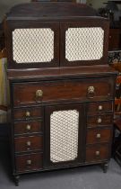 A 19th century Regency style mahogany cupboard, with pair of cupboard doors above secretaire