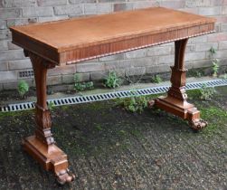 An unusual Hungarian ash hall table with leather inset top above frieze drawer, acanthus scrolling