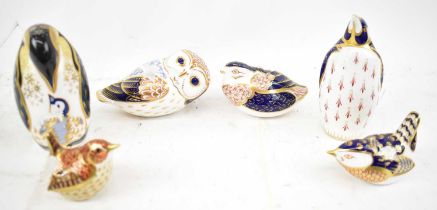 ROYAL CROWN DERBY; six assorted bird paperweights, three with gold stoppers, two with silver