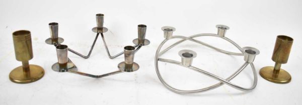 GEORG JENSEN; a Danish stainless steel four branch candle holder, a silver plated Danish candle