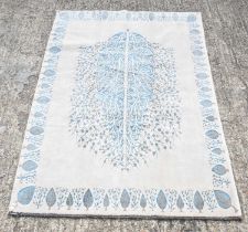 A hand knotted Persian woollen carpet with foliate design on a cream ground, 238 x 169cm.