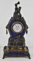 An unusual late 19th century Continental silver lapis lazuli mounted mantel timepiece with ornate