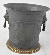 A late 19th century pewter and brass wine cooler, diameter 21cm, height 19cm.
