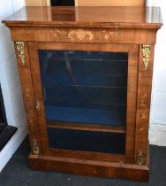 A Victorian inlaid walnut pier cabinet with gilt metal mounts and glazed door, width 81cm, height