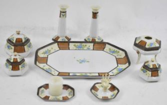NORITAKE; a nine piece dressing table set complete with tray.
