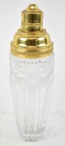 A clear glass cocktail shaker with gold plated top, height 28.5cm.