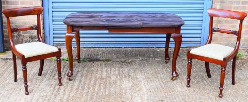An early 20th century mahogany wind-out extending dining table with extra leaf, 146 x 90cm, also a