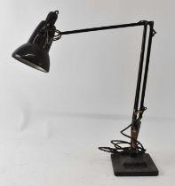 A black painted Anglepoise type lamp, height 48cm.