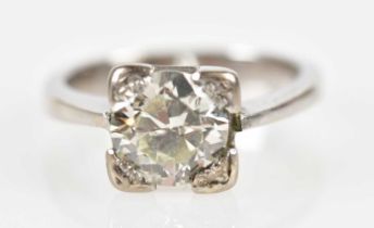An 18ct white gold and diamond solitaire ring, the round brilliant cut stone approx. 1.85ct set in