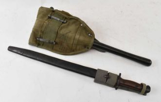 A WWII bayonet, length 57cm, and a US Korean War dagger and folding collapsible entrenching tool (