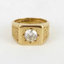 A gentleman's 9ct yellow gold diamond inset square signet ring with bead pattern shoulders, the claw