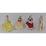 ROYAL DOULTON; a group of four ceramic figures from the 'Pretty Ladies' collection comprising '