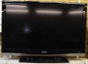 A Sharp 46 inch flat screen television.