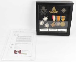 SOUTH AFRICAN CAMPAIGN; a framed display of medals to include War Medal, Victory Medal and 1914-15