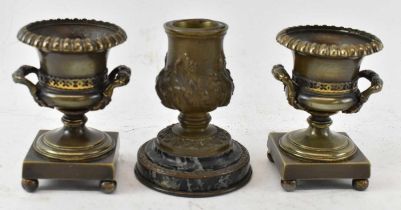 A pair of late 19th century twin handled bronze urns, height 10.5cm, and a late 19th century