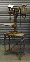 DENBIGH; a vintage cast iron drilling machine on a Ewbank base, height approx 175cm, width approx