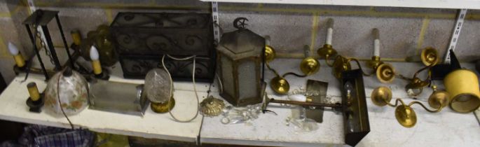 A quantity of light fixtures and fittings including three oak chandeliers, a set of four brass