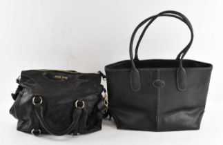 MIU MIU; a lady's black leather handbag and a Tod's black leather bag (2).