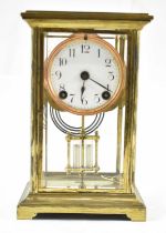 An early 20th century French four glass brass cased mantel clock with white painted dial, height