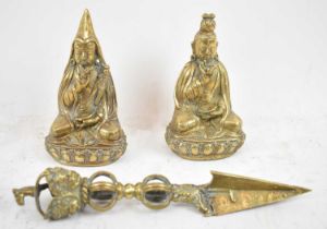 A pair of 19th century Nepalese polished brass seated figures, height approx. 12.5cm, and a