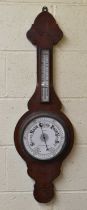 T. P. WRIGHT; an Edwardian wall mounted aneroid barometer/thermometer, height 92.5cm.