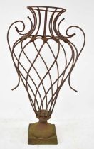 A decorative wrought iron openwork urn, height 66cm.