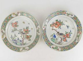 A pair of Chinese Export Famille Verte plates, Kangxi period (1662-1722), both decorated with