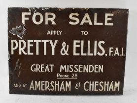 A vintage enamel double sided advertising sign for an estate agent, 'For Sale Apply to Pretty &