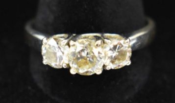 An 18ct white gold three stone diamond ring, total approx. 1.2ct, size T/U, approx. 5.4g.