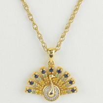 A diamond and gem set peacock pendant in 14ct gold on 9ct dainty link necklace, length of necklace