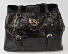 DKNY; a black crocodile skin effect leather handbag.