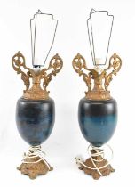 A pair of 20th century gilt metal mounted porcelain table lamps with shades, height 51cm.