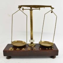 A set of reproduction brass balance scales, width 38cm.