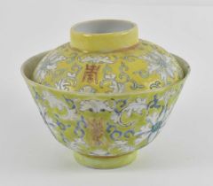 A Republic period Chinese porcelain bowl and cover painted in enamels with lotus blooms and chou