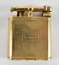 DUNHILL; a 9ct yellow gold cigarette lighter, height 5cm, width 4cm, approx 68g.