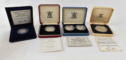 ROYAL MINT; four cased silver proof coin sets including the 1992 silver proof ten pence two coin