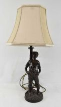 An early 20th century bronze figural table lamp modelled as a young boy, height to top of fitment