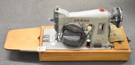 A cased sewing machine.